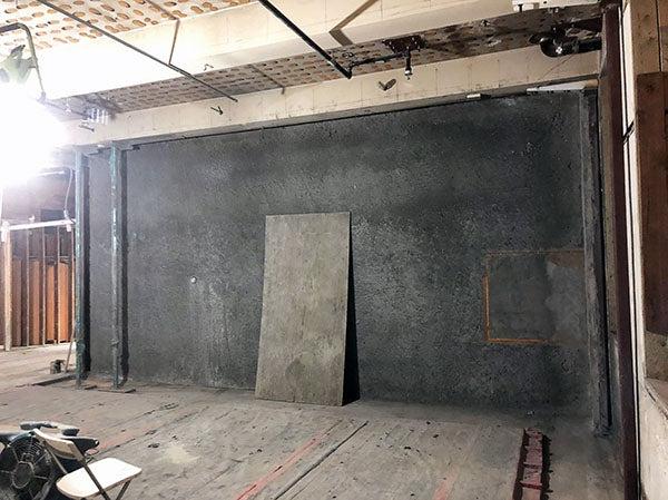 a concrete wall in a building under construction
